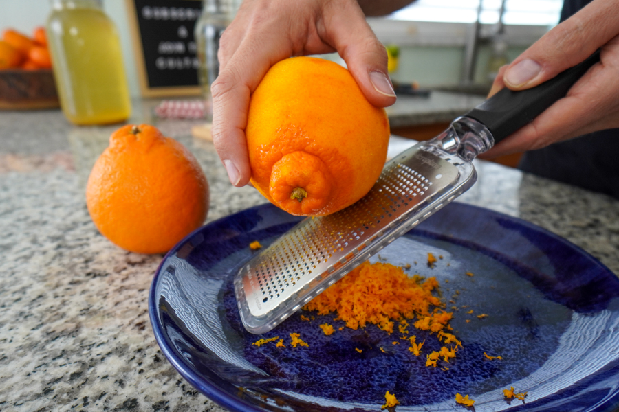 Zesting oranges for soda flavor