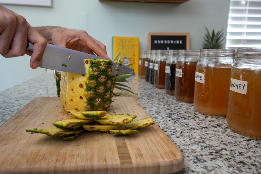 cutting pineapple